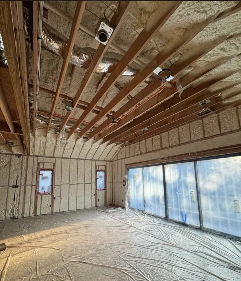Interior walls and ceiling insulated with spray foam during new construction in Carolina Forest